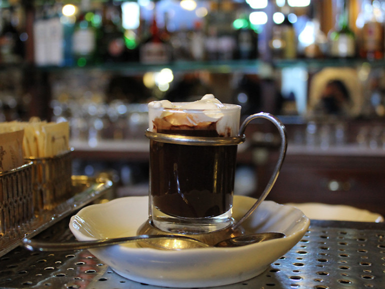 Bicerin, typical drink served in a small glass, at Caffè Mulassano, Turin, Italy